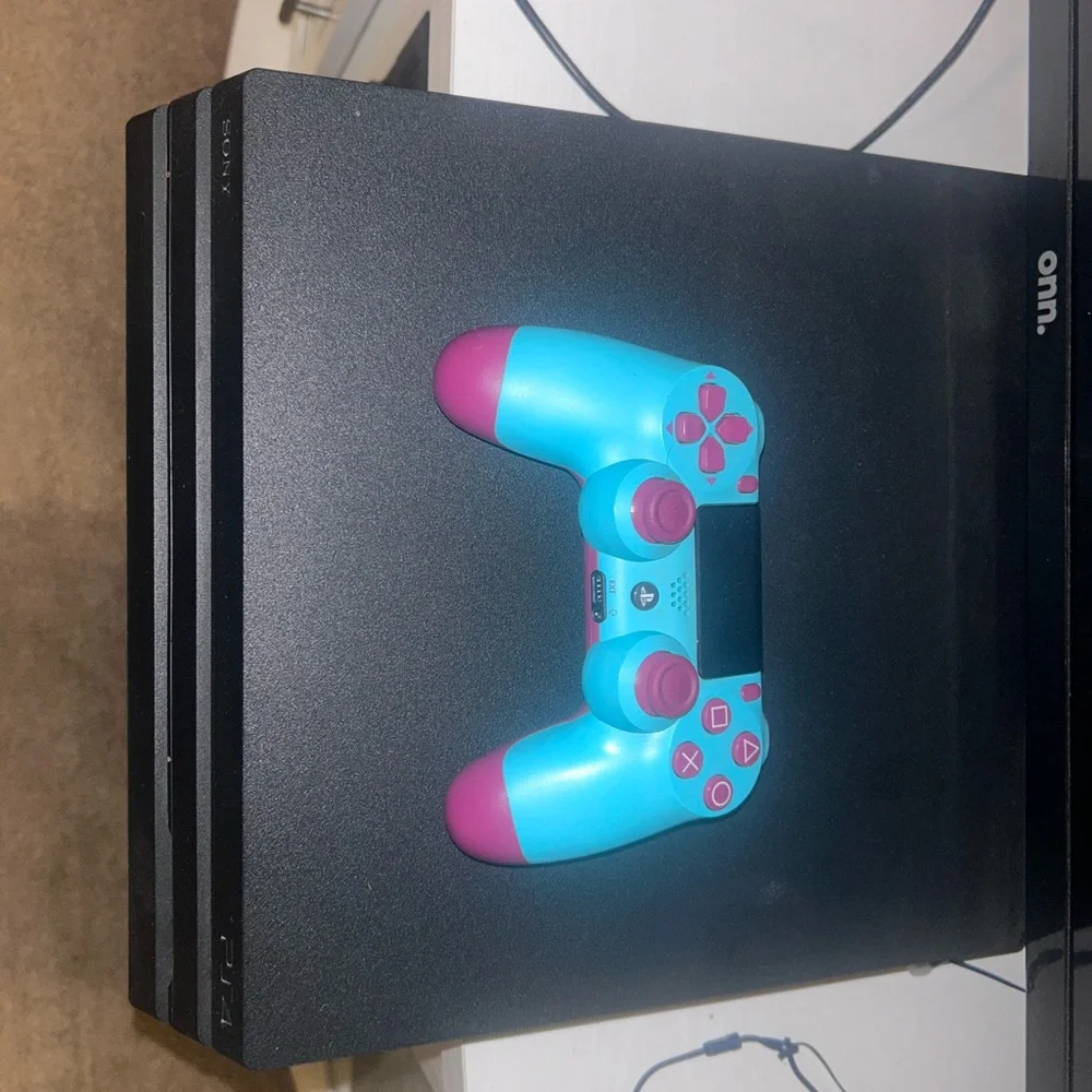 Sony PlayStation 4 Pro Console - Sleek Black Design